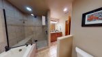 Master bathroom with walk in shower and bathtub with jets 